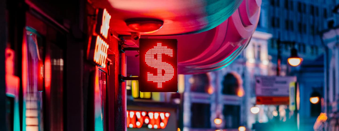neon dollar sign symbol at a currency exchange symbolising value for money