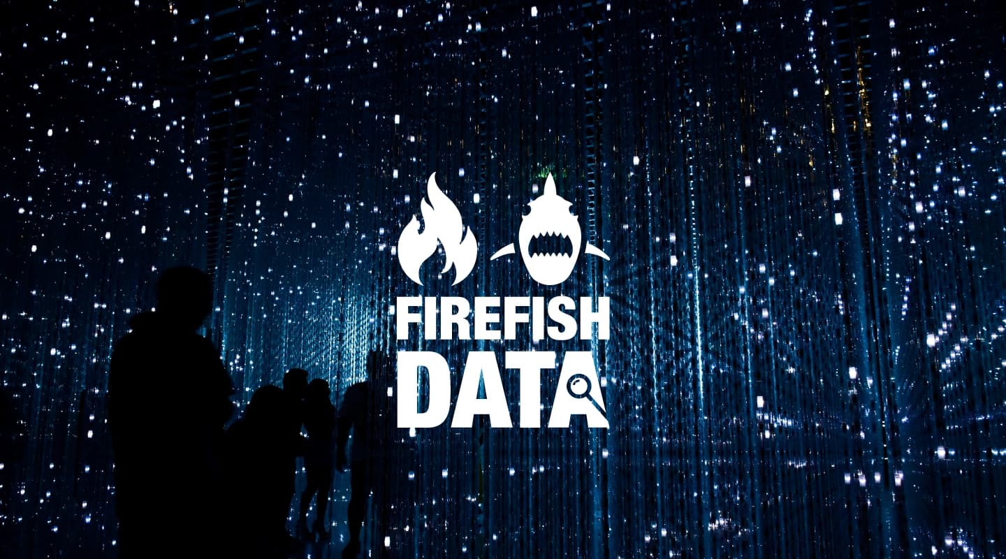 firefish data logo set against a backdrop of people in a lightroom exhibition representing humans and datapoints